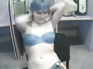 Blue haired punk chick teases on webcam