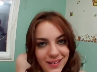 Blowjob and footjob from lusty redheaded babe