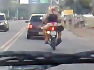 Hussy in thong riding a bike gets caught on a dash cam