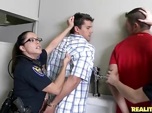 Two female police officers get ass fucked in an interrogation room