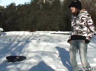 Britney Spring plays in the snow in some very tight jeans