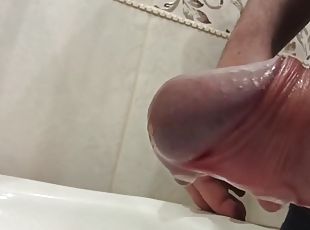 Close-up - piss from an uncut penis