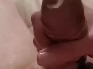 Handjob with a condom, rubbing sperm on penis