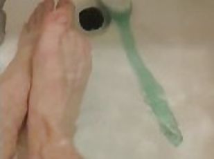 skinny twig strokes his cock and pissed in sink and shows off feet in bathtub