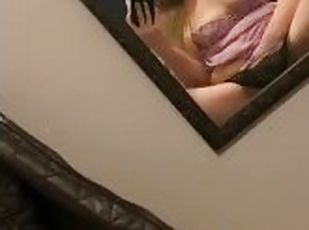 Masturbating in front of a mirror