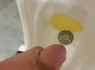 Pissing in public restroom and playing with my dick