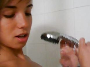 Hottie in the shower enjoys teasing the camera