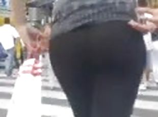 Sexy chick with nice butt gets caught on a hidded cam in the street