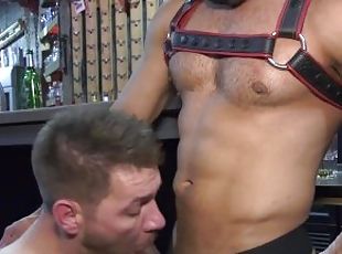 Two sexy German hunks meet at a gay cruising bar and have raw rough sex