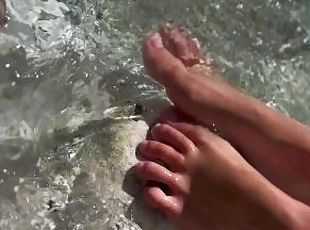 Playing with my feet on the water