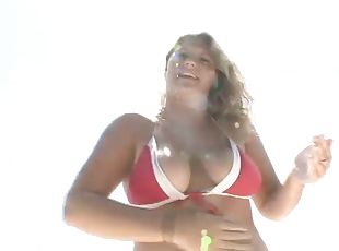 Blonde In Red Bikini with Immense Breasts Becomes a Freak In Public