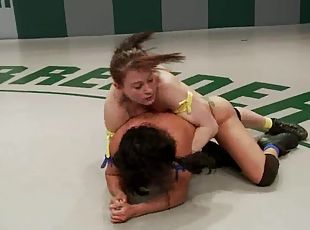 Horny girls in bikini wrestle in a ring and lick pussies