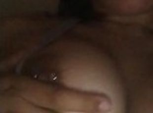 Sexy Latina playing with her nice titties