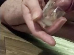 Soft cock cums in shot glass, then cum dump for more strokes