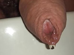 uncutted foreskin close up while peeing