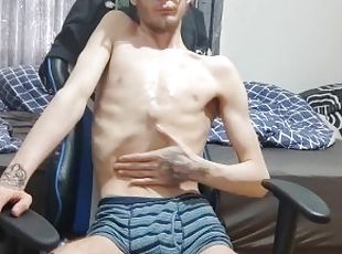 Extremely skinny teen oils up his body and shows his features