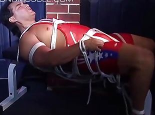 Muscular man Vincenzo is bound with rope