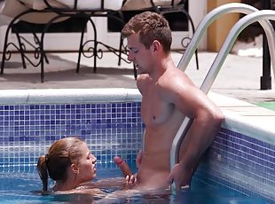 Horny Silvia Dellai sucking her boyfriend's dick while in the pool