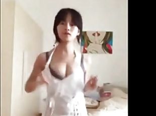 Cute Chinese girl with big boobs playing with her panties