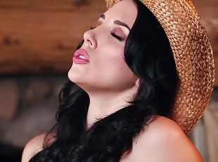 Sexy cowgirl Jelena Jensen playing with a wooden dildo and cumming