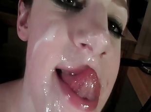 She nearly gags on his long cock before he busts a nut on her face