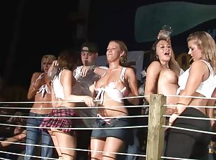 A few sizzling girls show their boobs at wet t-shirt show