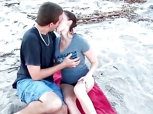Kissing a cutie that sucks his dick on the beach