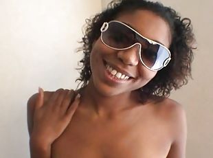 Wavy haired ebony cowgirl being face fucked in a close up pov action