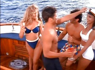 Three pmates, frolic nude on a yacht.