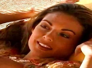 Stunning Merritt Cabal lies on a hammock showing her tits