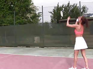 Fit tennis babe in a short skirt masturbates on the court