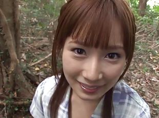 Pretty Japanese girl drops to her knees outdoors & gives a blowjob