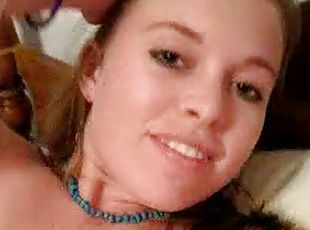 Horny chick with a blue necklace shows her tits