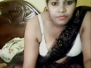 A hot Desi Bhabhi teasing on the webcam