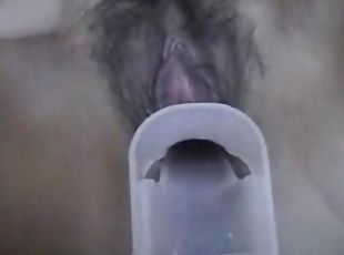 Freaky Asian chick and her guy have a piss part