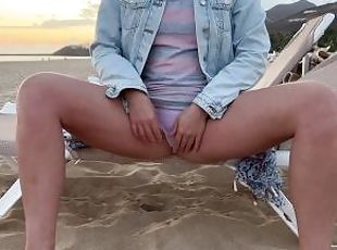 girl pissing on the beach in public through panties