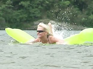 She meets a guy at the lake and up surfing on his cock