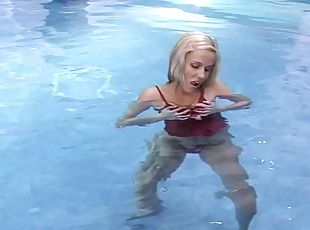 Icy hot blonde solo model in a sexy thong masturbating poolside