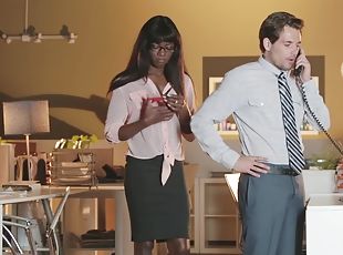 Ebony beauty sucks her office colleague with a huge dong