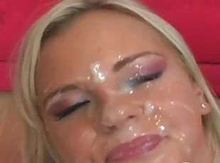 Bree Olson sucks two cocks and gets a bukkake on her cute face