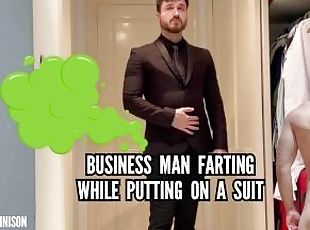 Businessman farting while he put on his suit